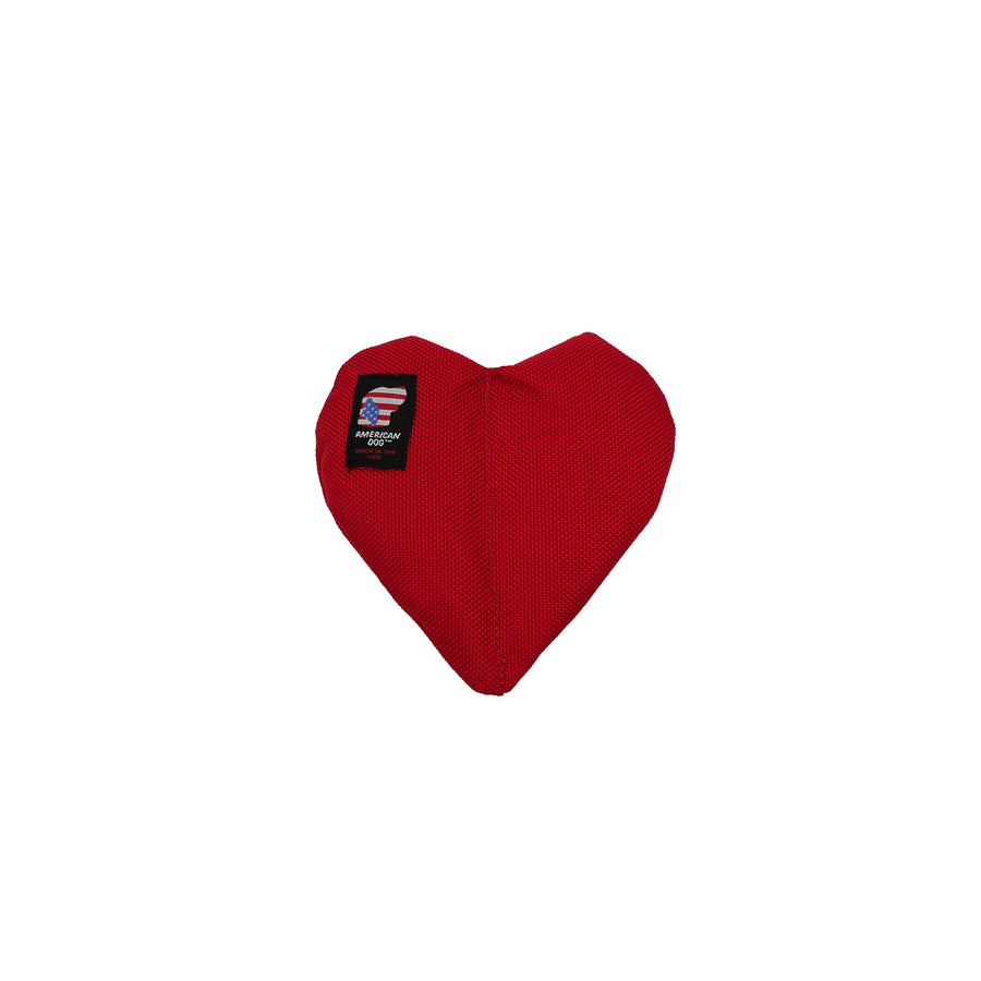 Red heart shaped dog toy 