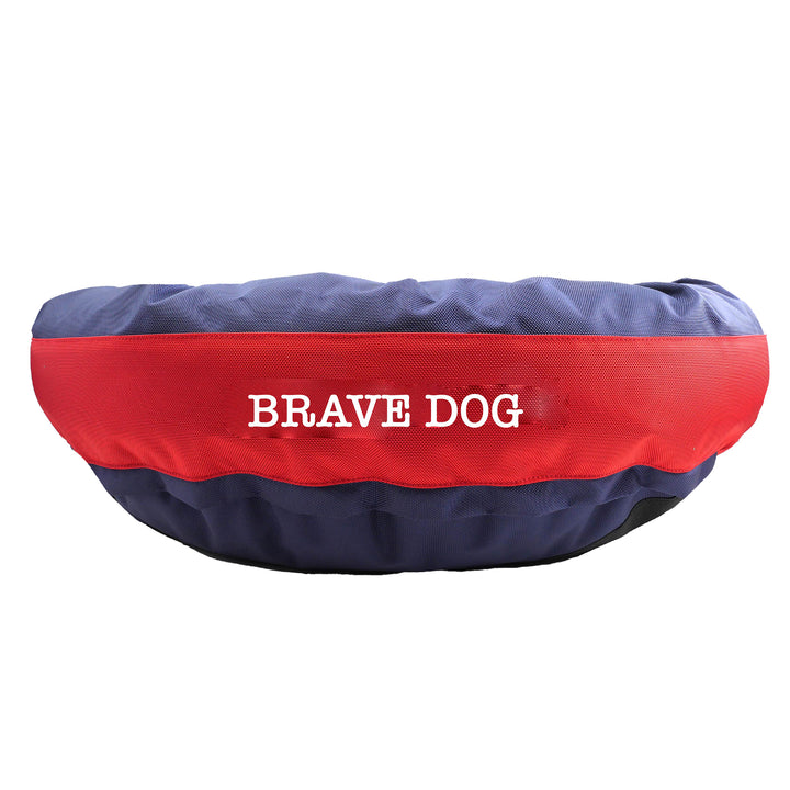 Navy round bolstered dog bed with a red band in the middle, embroidered 'Brave Dog' in white.