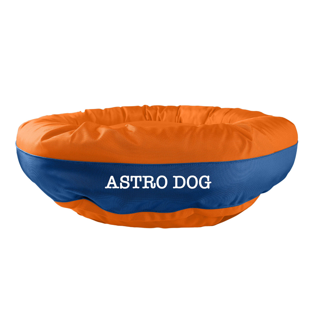 Orange bolstered dog bed with blue band in center with 'Astro Dog' white embroidery.