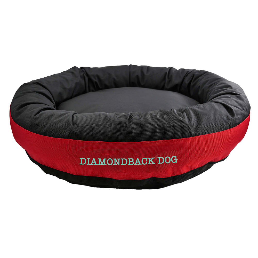 Black round bolstered dog bed with a red band with teal embroidered 'Diamondback Dog'