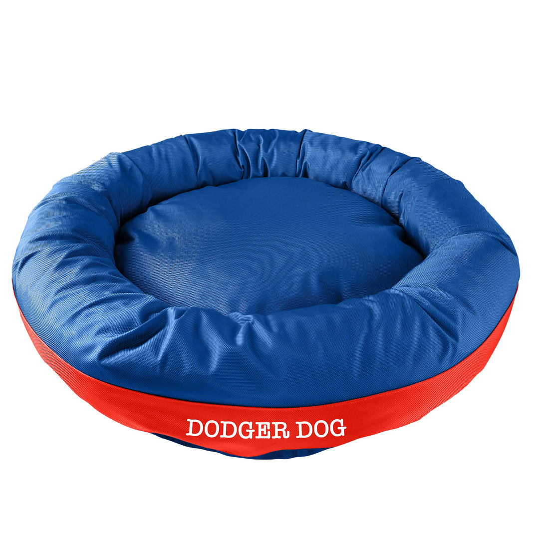 Royal round bolstered dog bed with a red band with white embroidered 'Dodger Dog'.