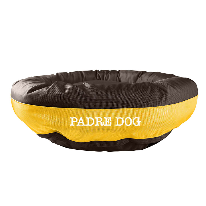 Brown round bolstered dog bed with a yellow band and white embroidered 'Padre Dog'.