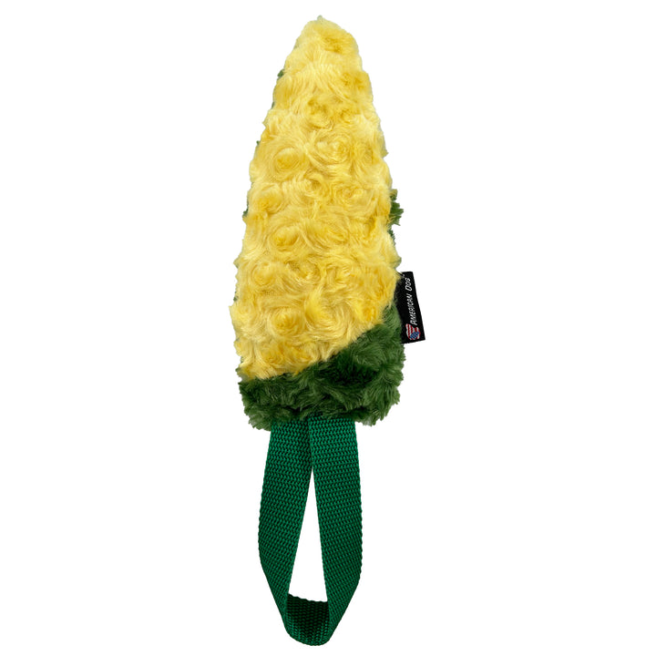 Yellow and green corn shaped dog toy with a green handle