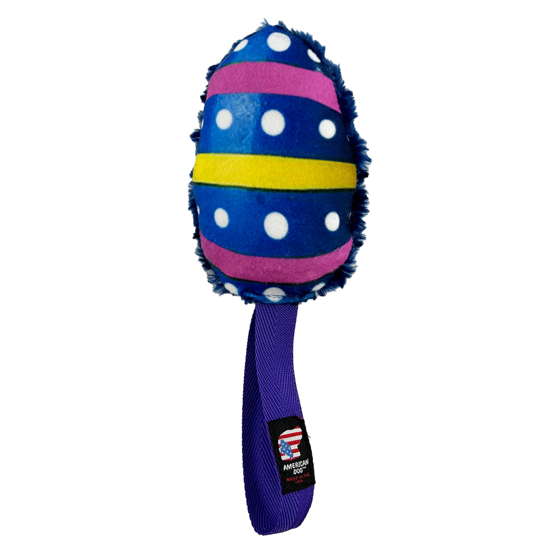 Blue Egg shaped with white dots and yellow and pick stripes with a purple web handle