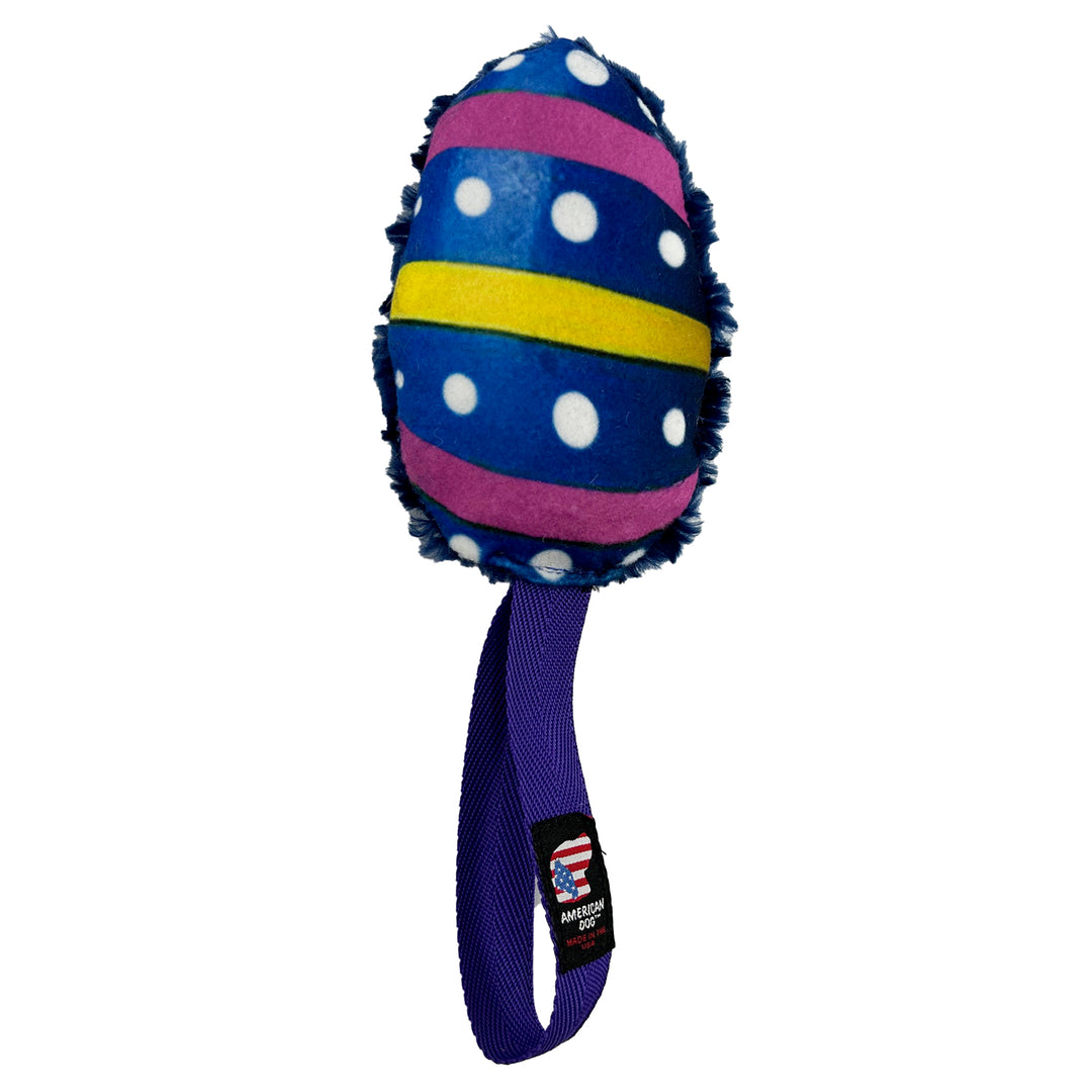 Blue Egg shaped with white dots and yellow and pick stripes with a purple web handle