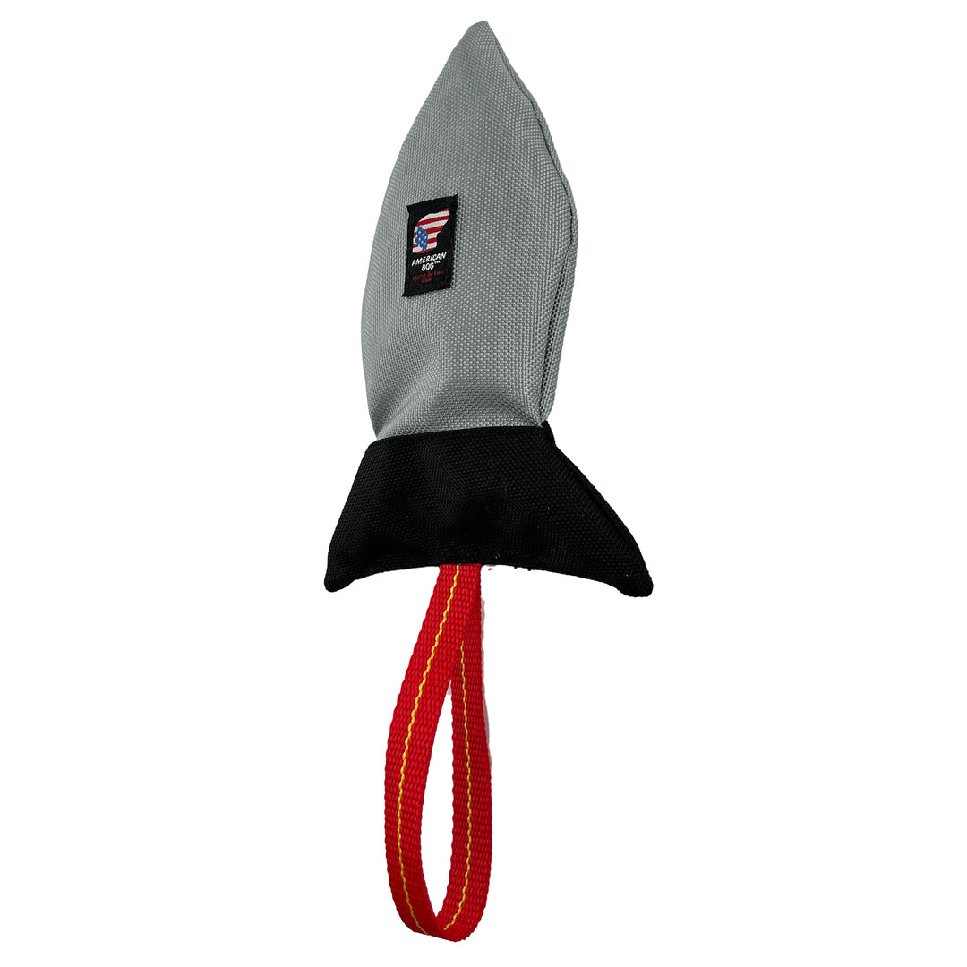 Rocket ship shaped dog toy in silver and black with red web handle