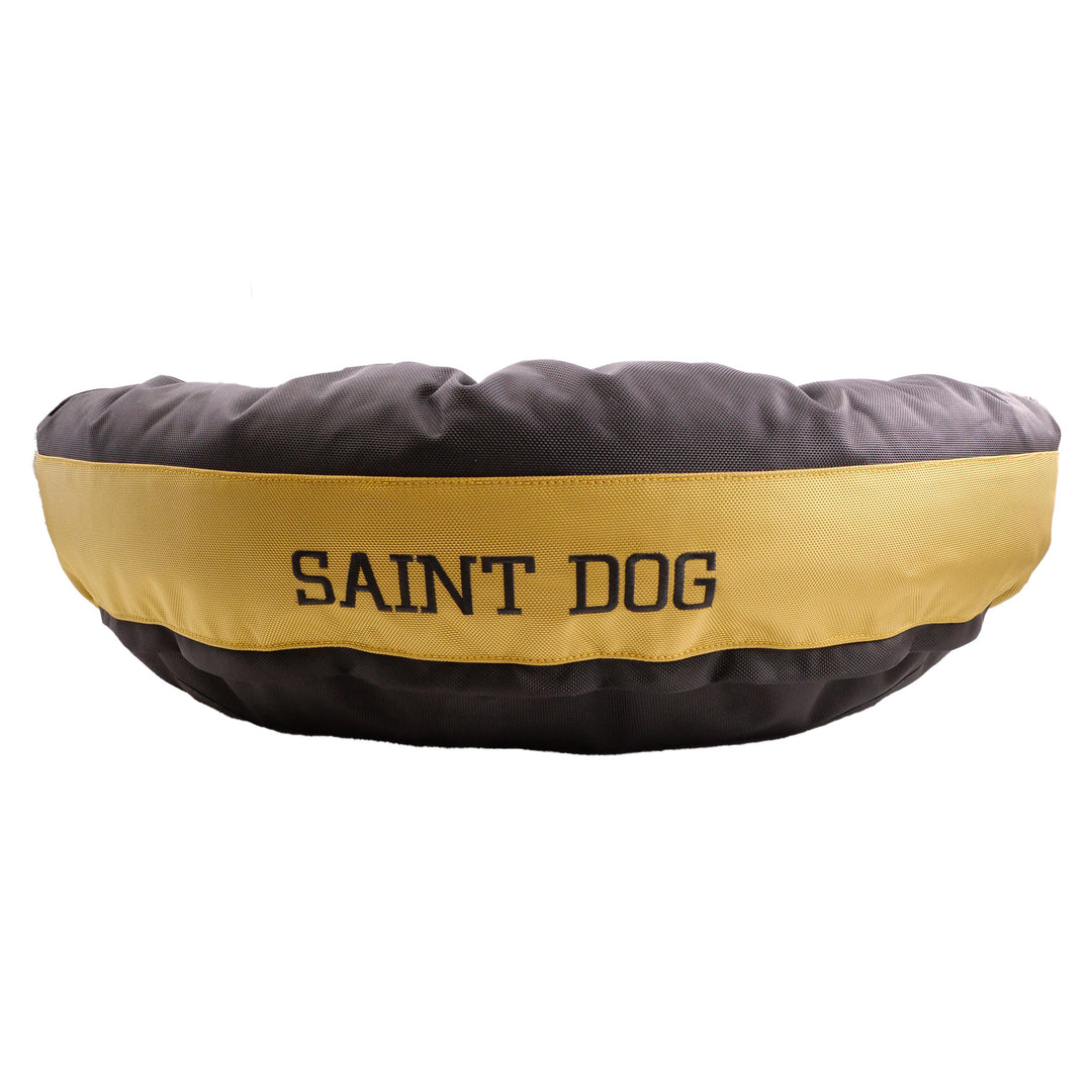Black round bolstered dog bed with  a gold band embroidered in black, Saint Dog
