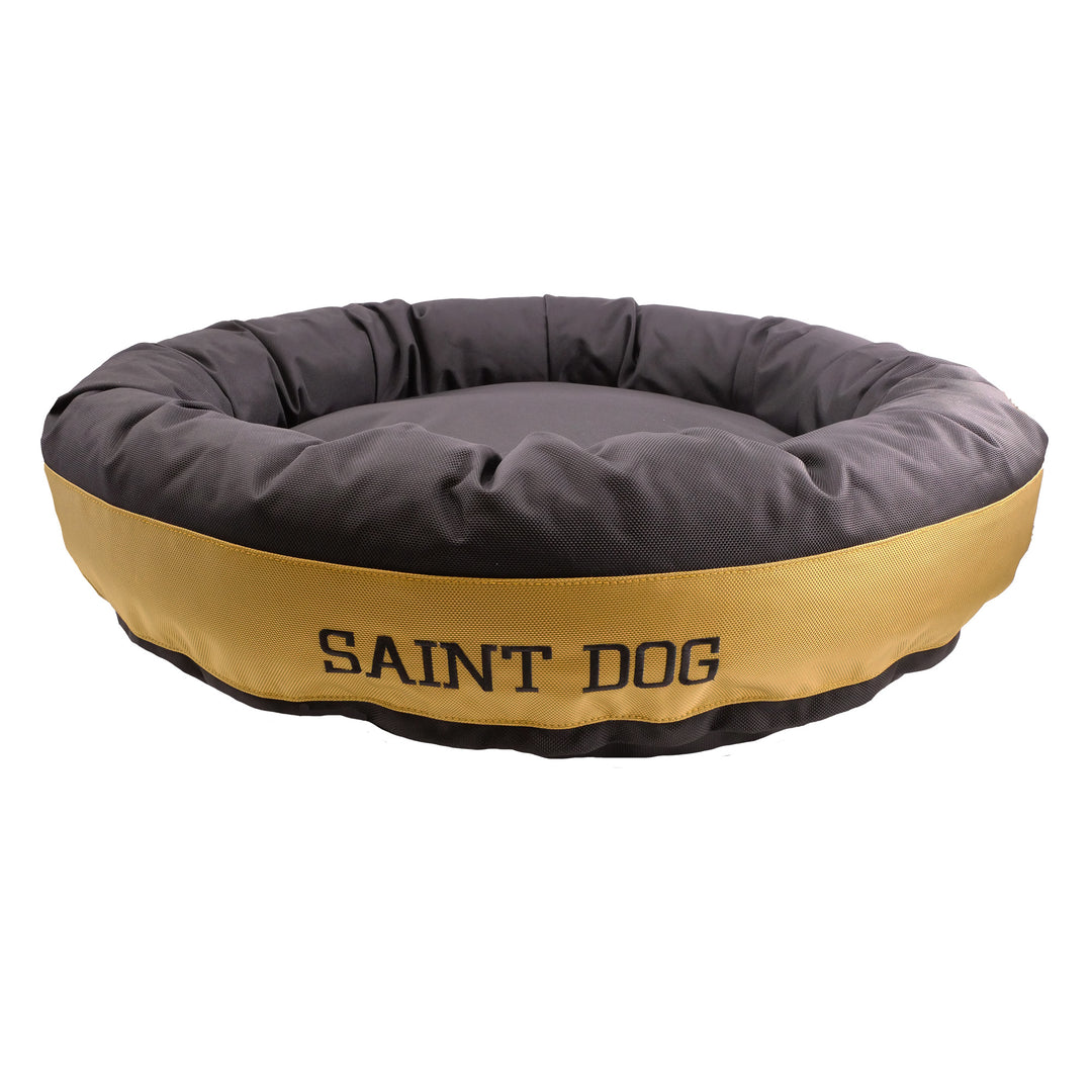 Black round bolstered dog bed with a gold band embroidered in black, Saint Dog