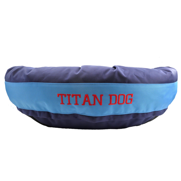 Blue and light blue round bolstered dog bed ,Titan Dog embroidered in red